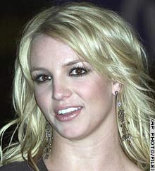 Britney Spears, 22, walked down the aisle in blue jeans and a baseball cap, according to People.com.
