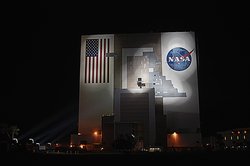 Xenon lights illuminate the 525 ft. (160 m) tall Vehicle Assembly Building at Kennedy Space Center, Florida where workers make repairs on September 30, 2004.