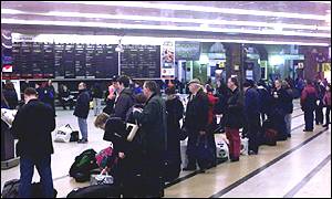 Delayed passengers in London's Kings Cross station