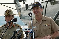 photo - Commander U.S. 7th Fleet, Vice Adm. Jonathan W. Greenert and Commander 1st Division, Deployable Joint Force Headquarters, Maj. Gen. Mark Kelly greet the local media.