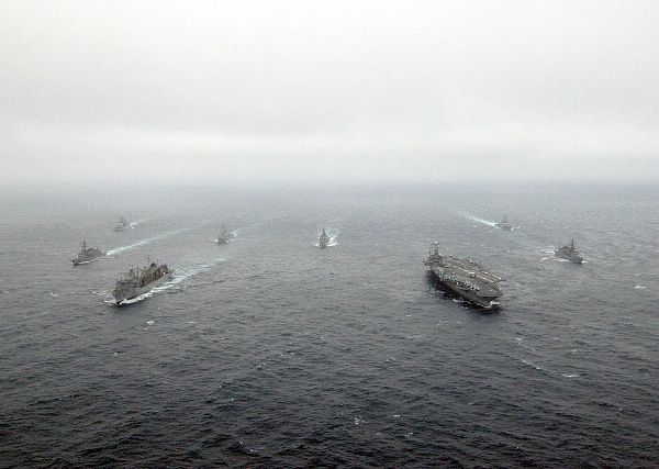 photo - The Nimitz-class aircraft carrier USS Abraham Lincoln (CVN 72) conducts a passing exercise with the Japanese Maritime Self Defense (JDS) force vessels.