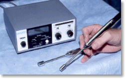 Dr. Norman with a parathyroid probe made by US Surgical Corp used for mini parathyroid surgery and parathyoid operations.